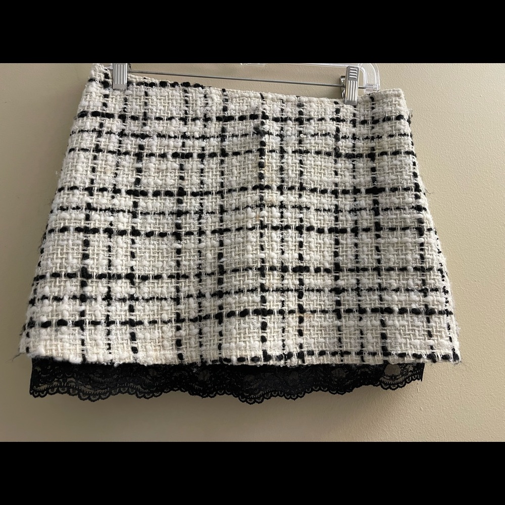 Wool mini skirt black and cream accented size 2 with black lace hem at bottom